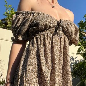 Beautiful cottage core style dress with flower printed fabric.